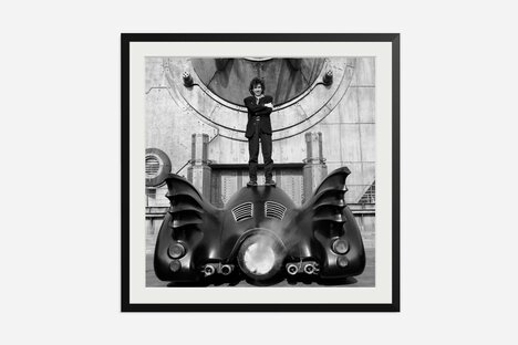Tim Burton on The Batmobile Framed Print