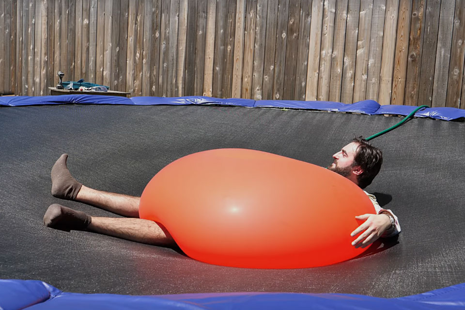 Exploding Giant Water Balloon in Slow Motion.